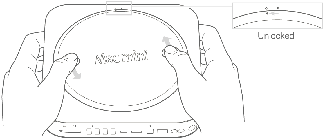 Two hands rotating the bottom cover of Mac mini