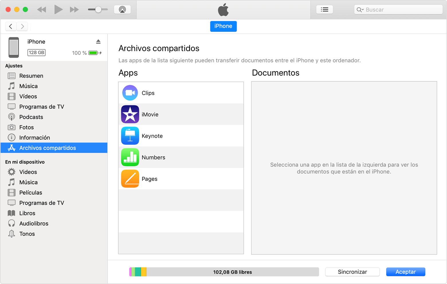 Ventana de iTunes con iPhone conectado y Compartir archivos seleccionado en la lista.