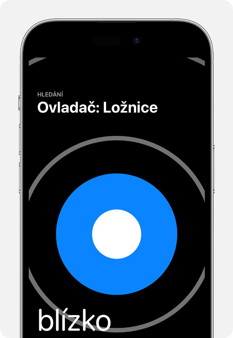 Na obrazovce iPhonu se objeví velký modrý kruh s textem blízko