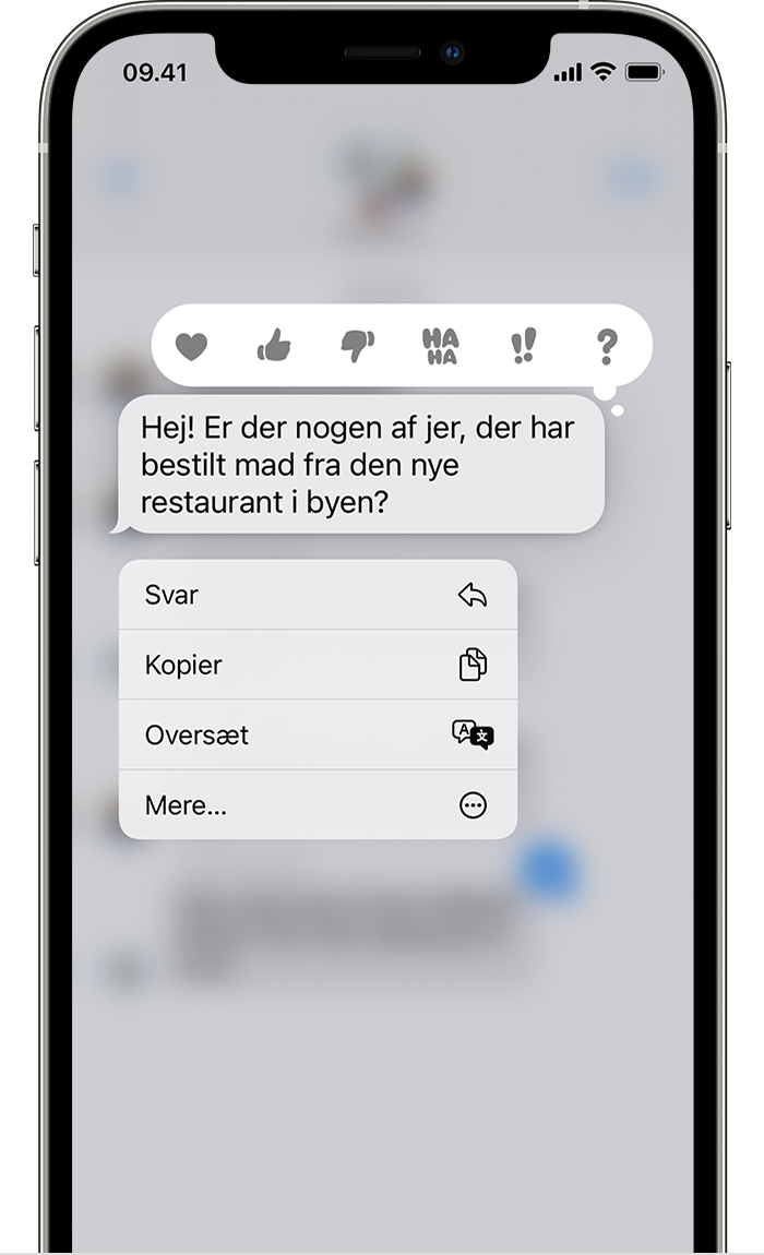 iPhone, der viser en menu med integrerede svar, når du trykker og holder nede på en beskedboble for at sende et integreret svar.