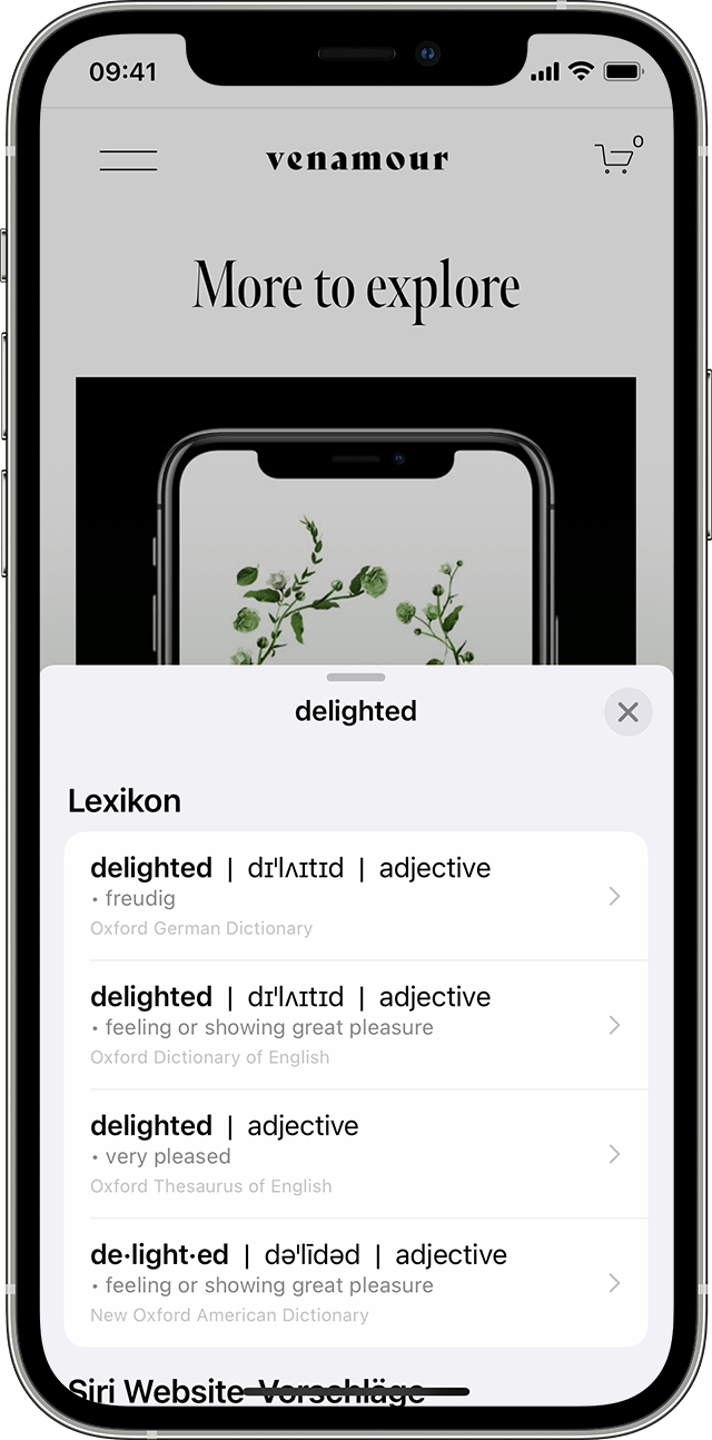 Ein:e iPhone-Benutzer:in hat mithilfe von Live Text das Wort "delighted" in einem Foto erkannt und schlägt es im Wörterbuch nach