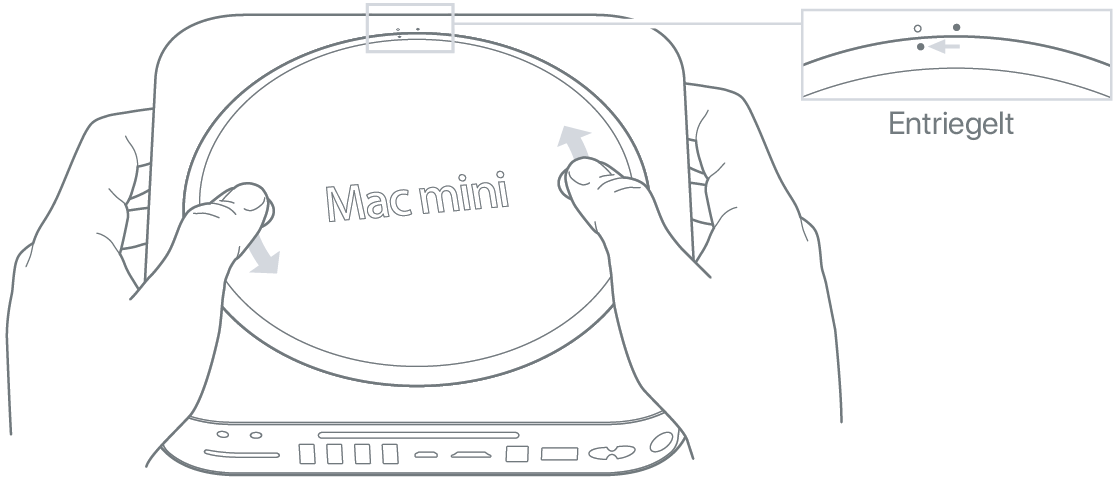 Zwei Hände drehen die untere Abdeckung des Mac mini.