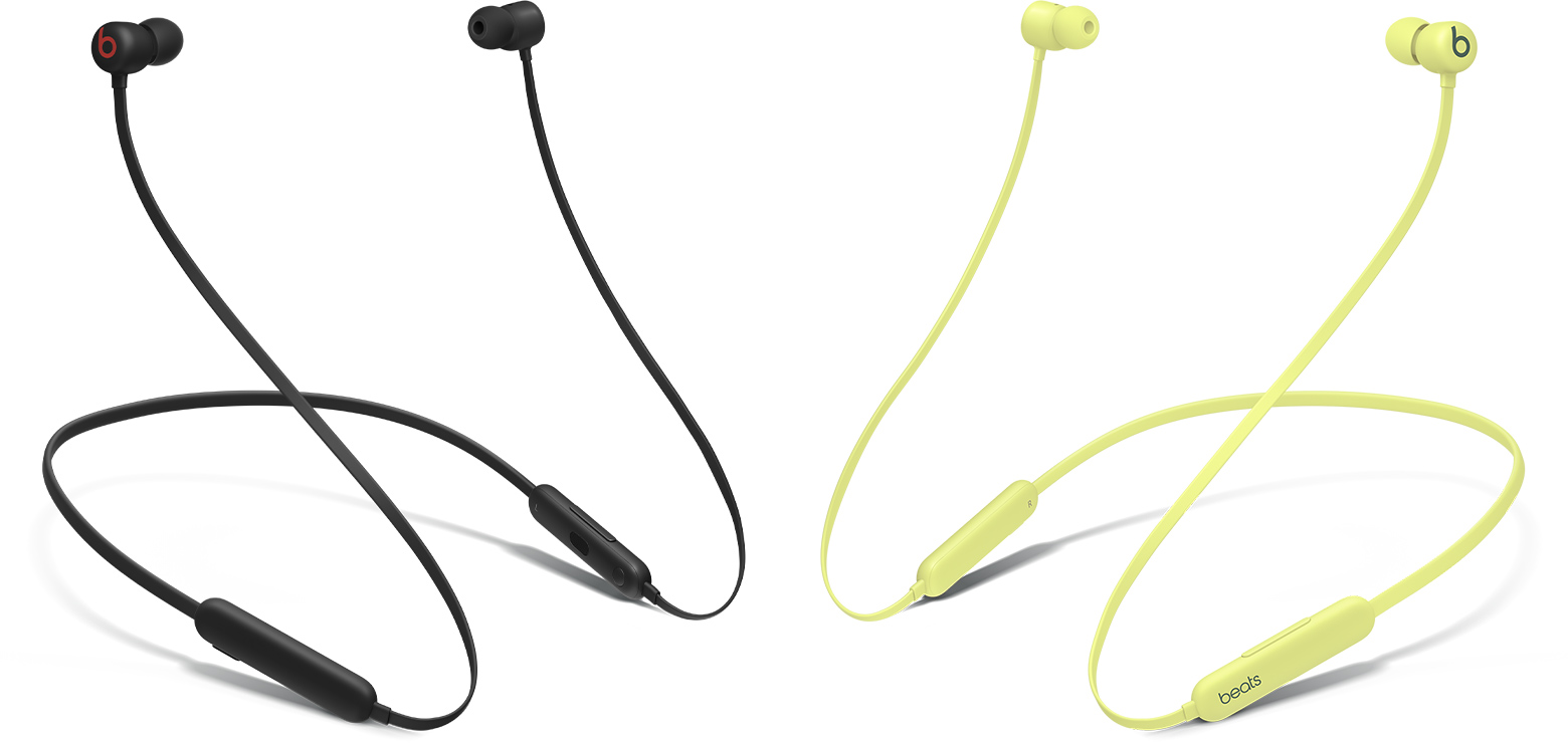 two pairs of earphones facing opposite directions