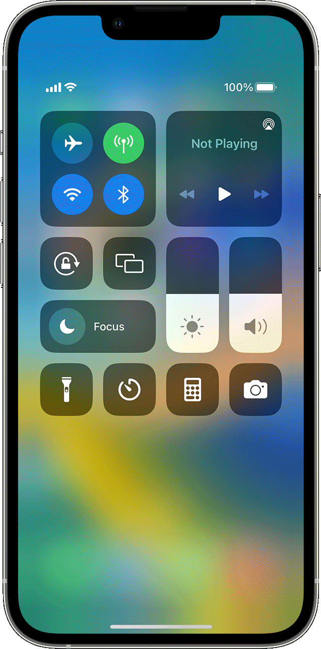 Adjusting an iPhone's brightness using Control Centre.