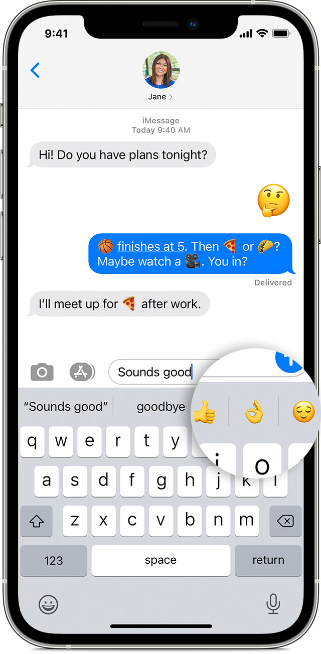 An iPhone screen showing a Messages conversation with predictive emoji magnified at the top of the keyboard.