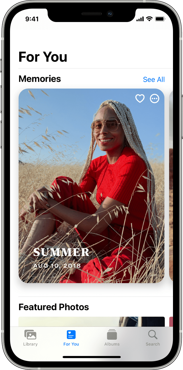 iPhone Photos For You screen with Memories shown
