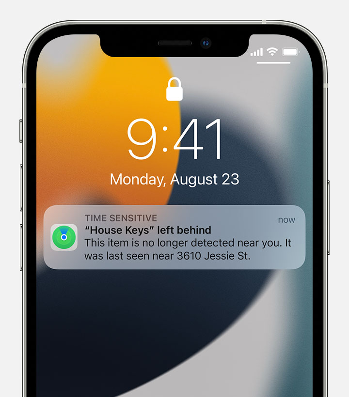 A time-sensitive notification on an iPhone screen with a message that says "House Keys" left behind. 