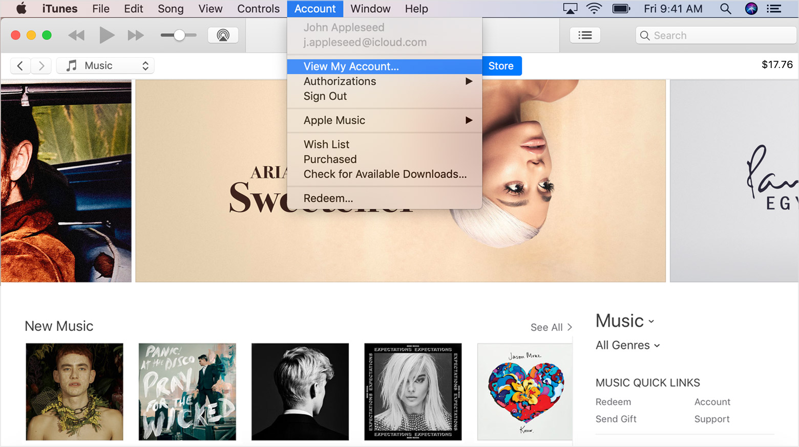 The iTunes Account menu open and View My Account selected. An iTunes Store window is visible in the background.