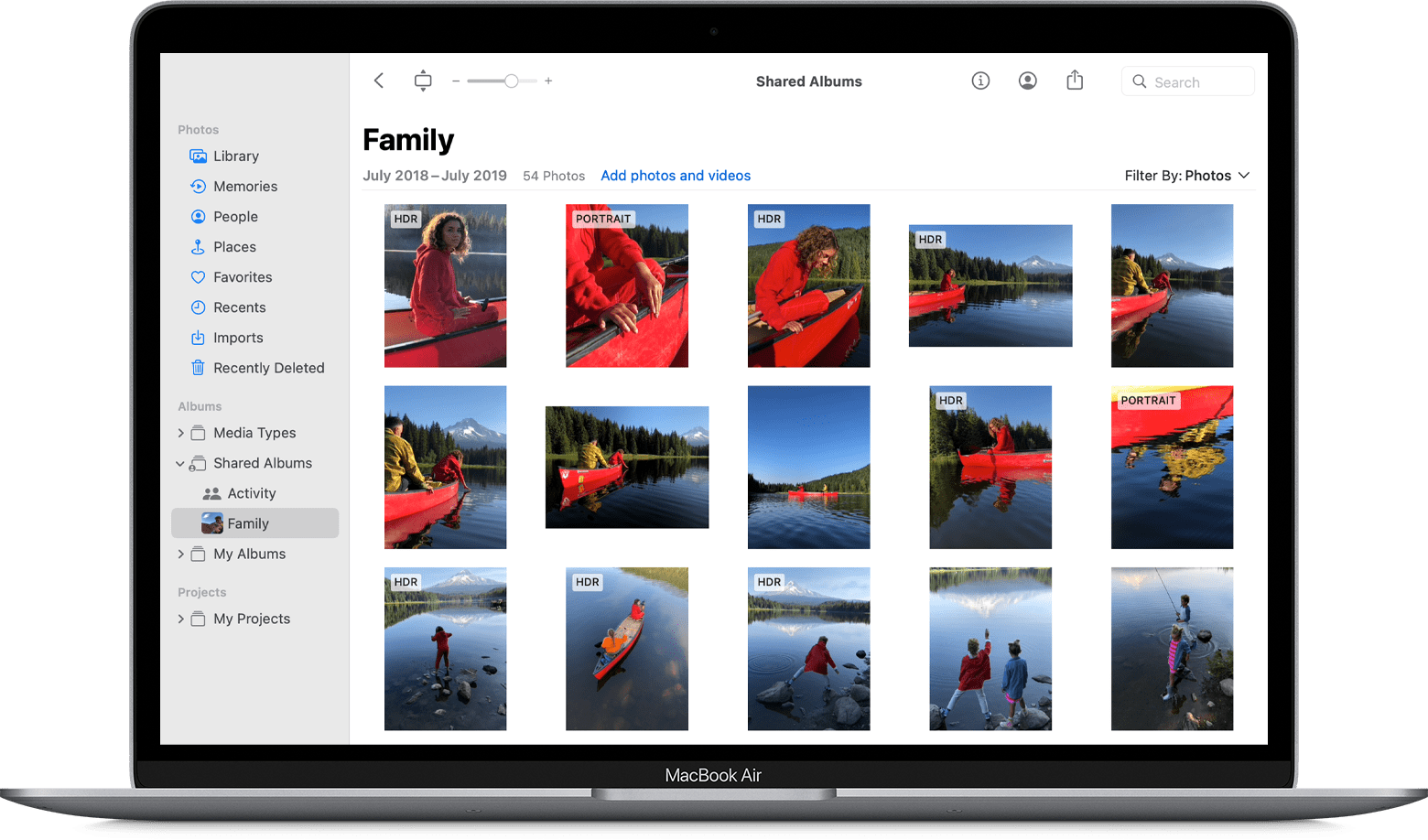 MacBook Air with Photos app showing a shared family album