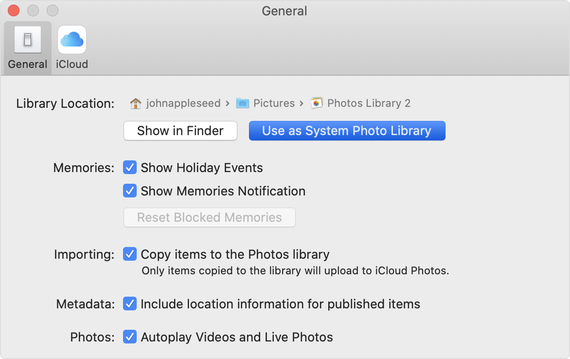 how to change iphoto library location