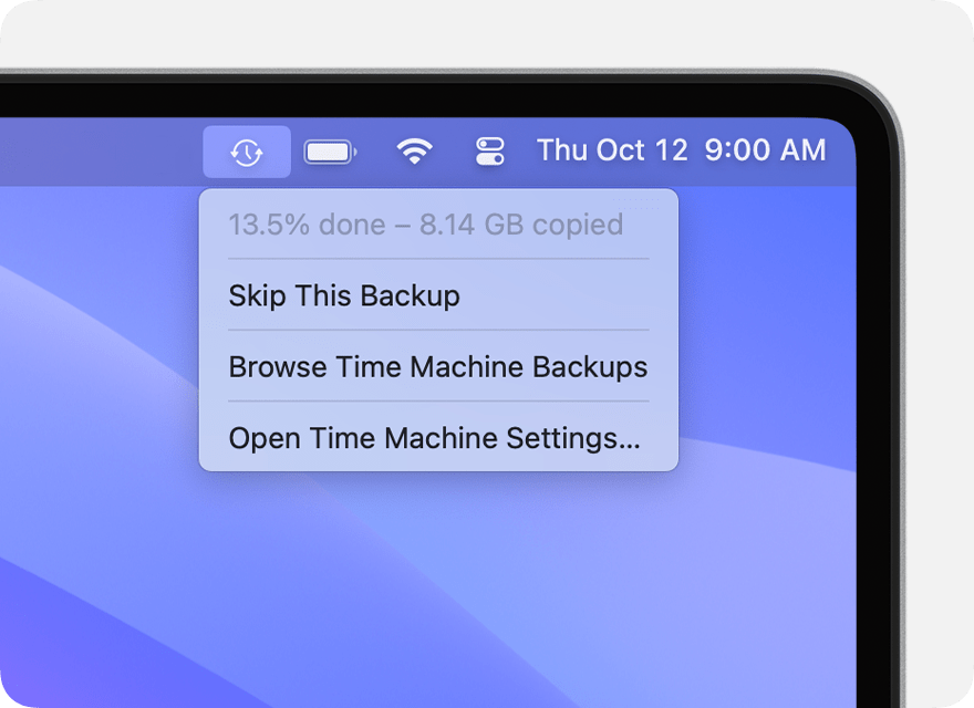 Time Machine menu showing a backup in progress