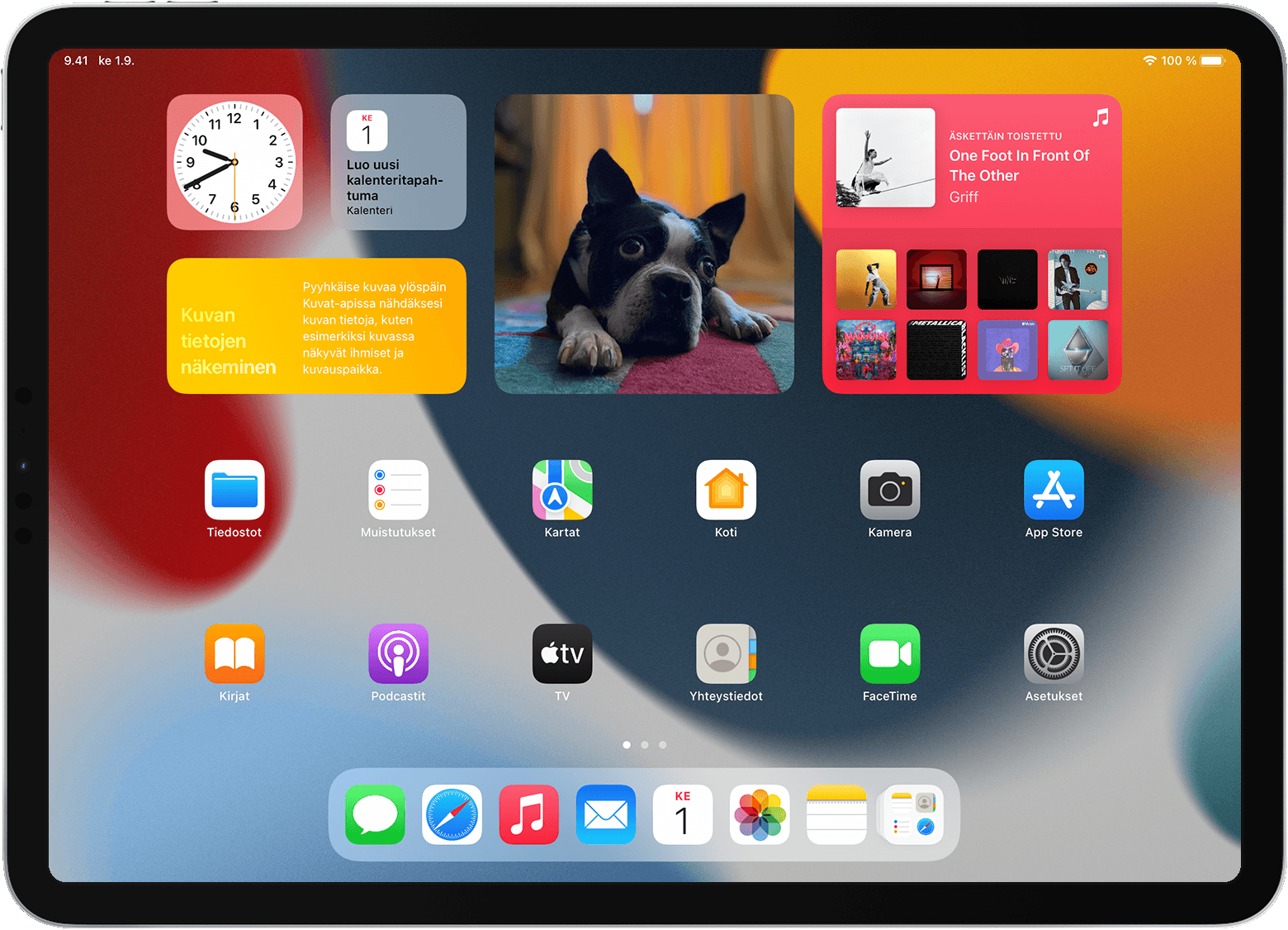 iPadin Koti-valikko, jossa näkyvät widgetit ja apit