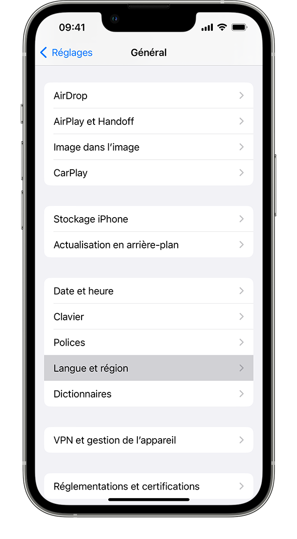 Un iPhone affichant le menu des réglages généraux; l’option Langue et région est en surbrillance.