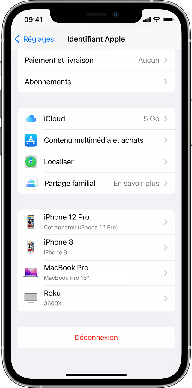 Capture d’écran d’un iPhone affichant le menu Identifiant Apple dans Réglages. Les appareils sont répertoriés en bas de l’écran.