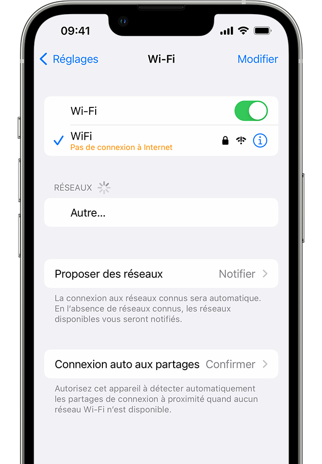 Un iPhone montrant l’écran Wi-Fi. Un message d’alerte apparaît sous le nom du réseau Wi-Fi.
