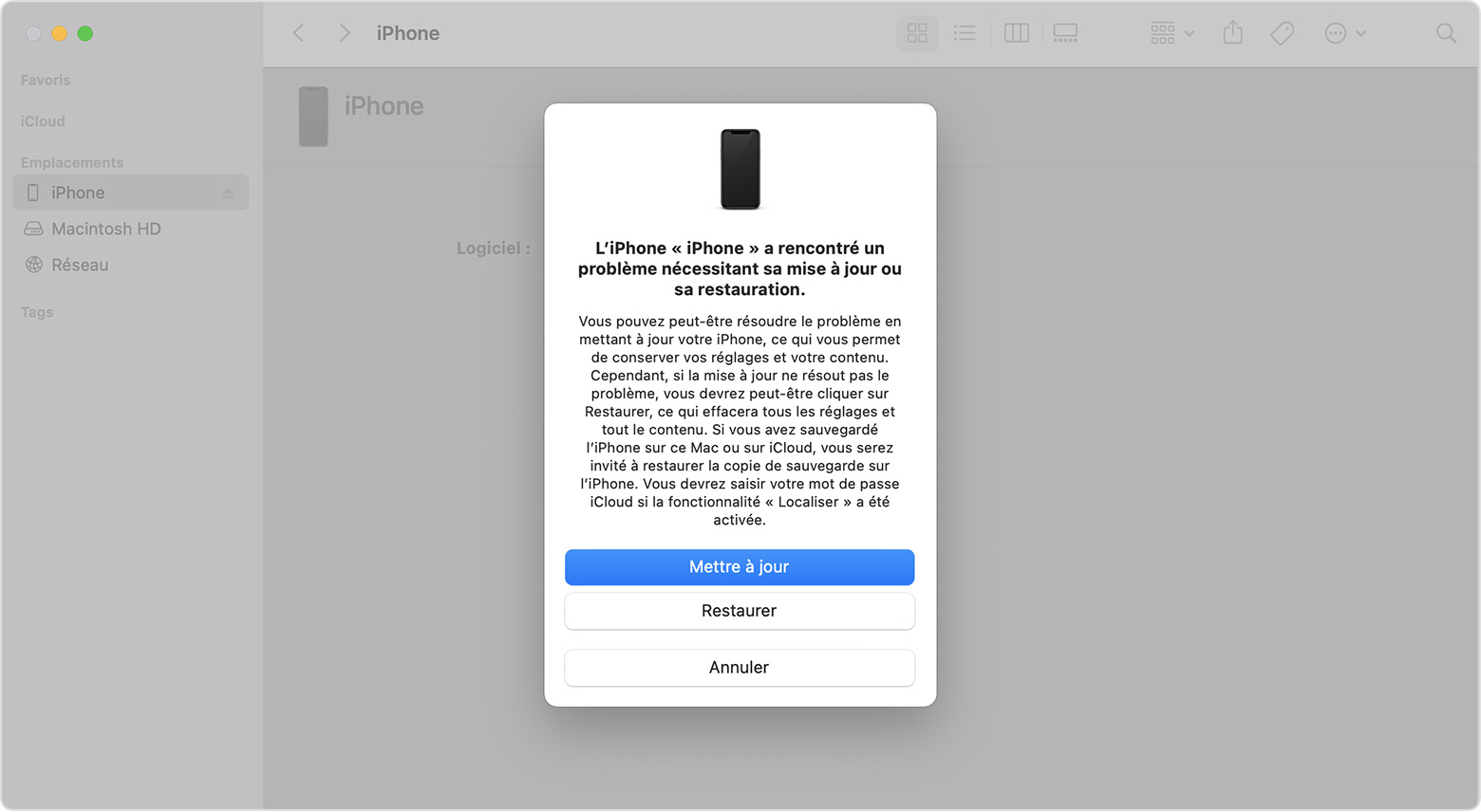 Fenêtre du Finder invitant à mettre à jour ou à restaurer l’iPhone. L’option Mettre à jour est sélectionnée.