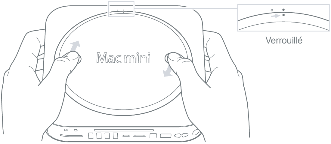 Un Mac mini vu du dessous, avec le couvercle inférieur en position verrouillée