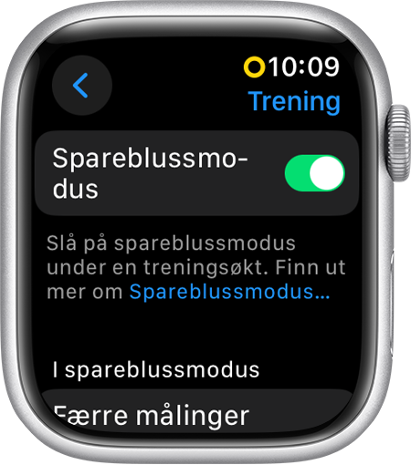 En Apple Watch som viser Spareblussmodus i innstillingene for Trening