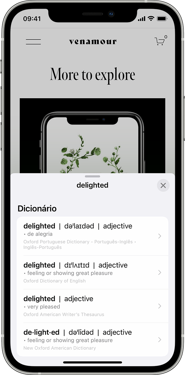Um usuário do iPhone procura a palavra “contente” em um dicionário depois de usar o Texto ao Vivo para identificar a palavra em uma foto
