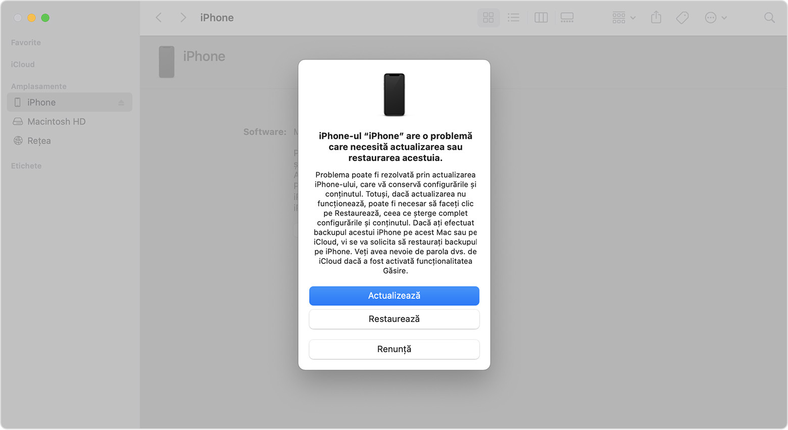 O fereastră Finder cu o solicitare de a actualiza sau a restaura dispozitivul iPhone. Este selectată opțiunea Actualizați.