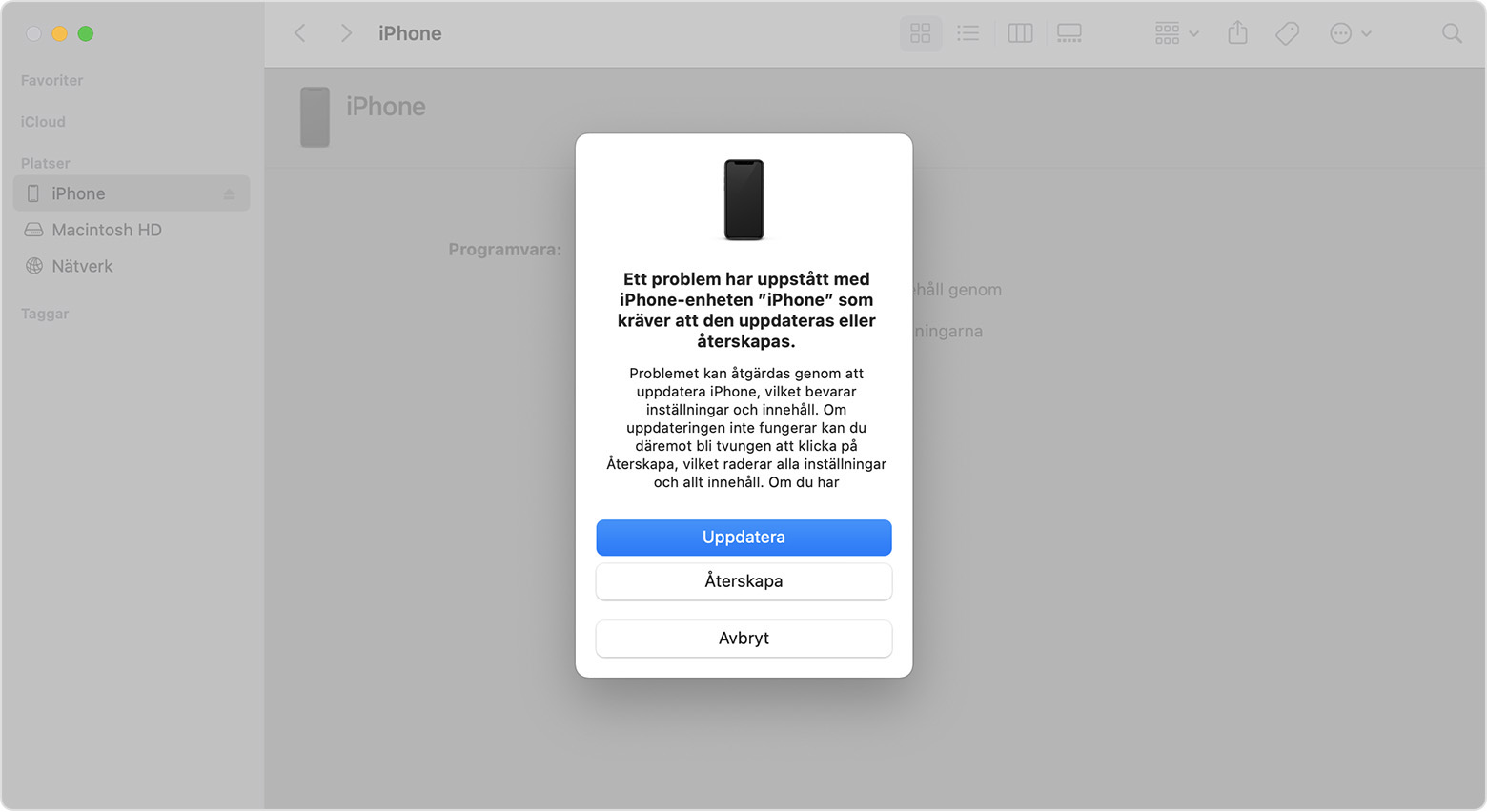 Ett Finder-fönster visar en markör med valet att uppdatera eller återställa din iPhone. Uppdatering är vald.