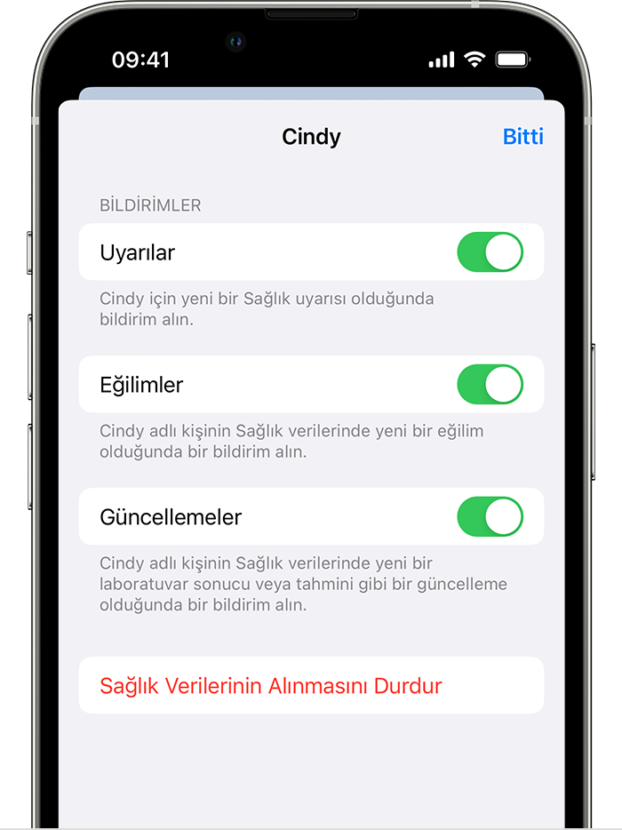 Sağlık verilerini başka bir kişiyle paylaşırken Uyarılar'ı, Eğilimler'i veya Güncellemeler'i kapatma seçeneklerini gösteren bir iPhone ekranı.