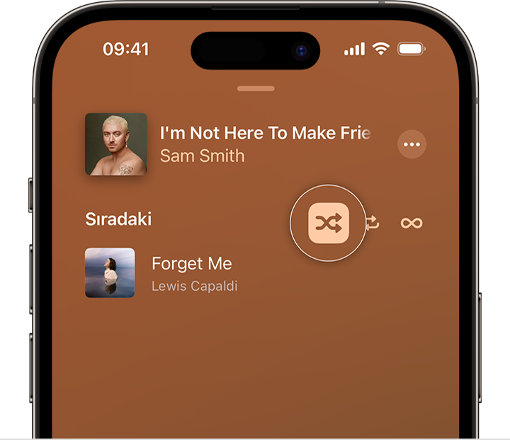 Müzik uygulamasında Sıradaki düğmesinin üst kısmındaki Karıştır düğmesini gösteren iPhone